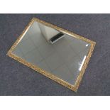 A gilt framed bevelled mirror