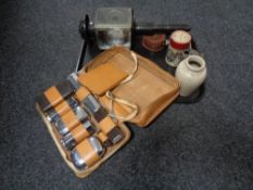 A tray of leather travel set, hip flask, vintage coach lamp,