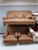 A good quality three piece Victorian style lounge suite in a tapestry fabric and scatter cushions