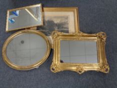 A gilt framed antiquarian black and white etching together with three gilt framed mirrors