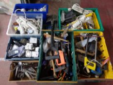 A pallet of crates of hand tools, hard ware, plastic sockets, extension leads,