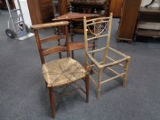 An antique rush seated prayer chair together with a bedroom chair lacking seat and a three tier
