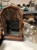 A 19th century American clock case and a glass circular shade
