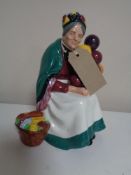 A Royal Doulton figure, The Old Balloon Seller,