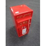 A reproduction cast iron Royal Mail red post box