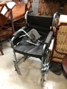 A folding Days Escape wheel chair
