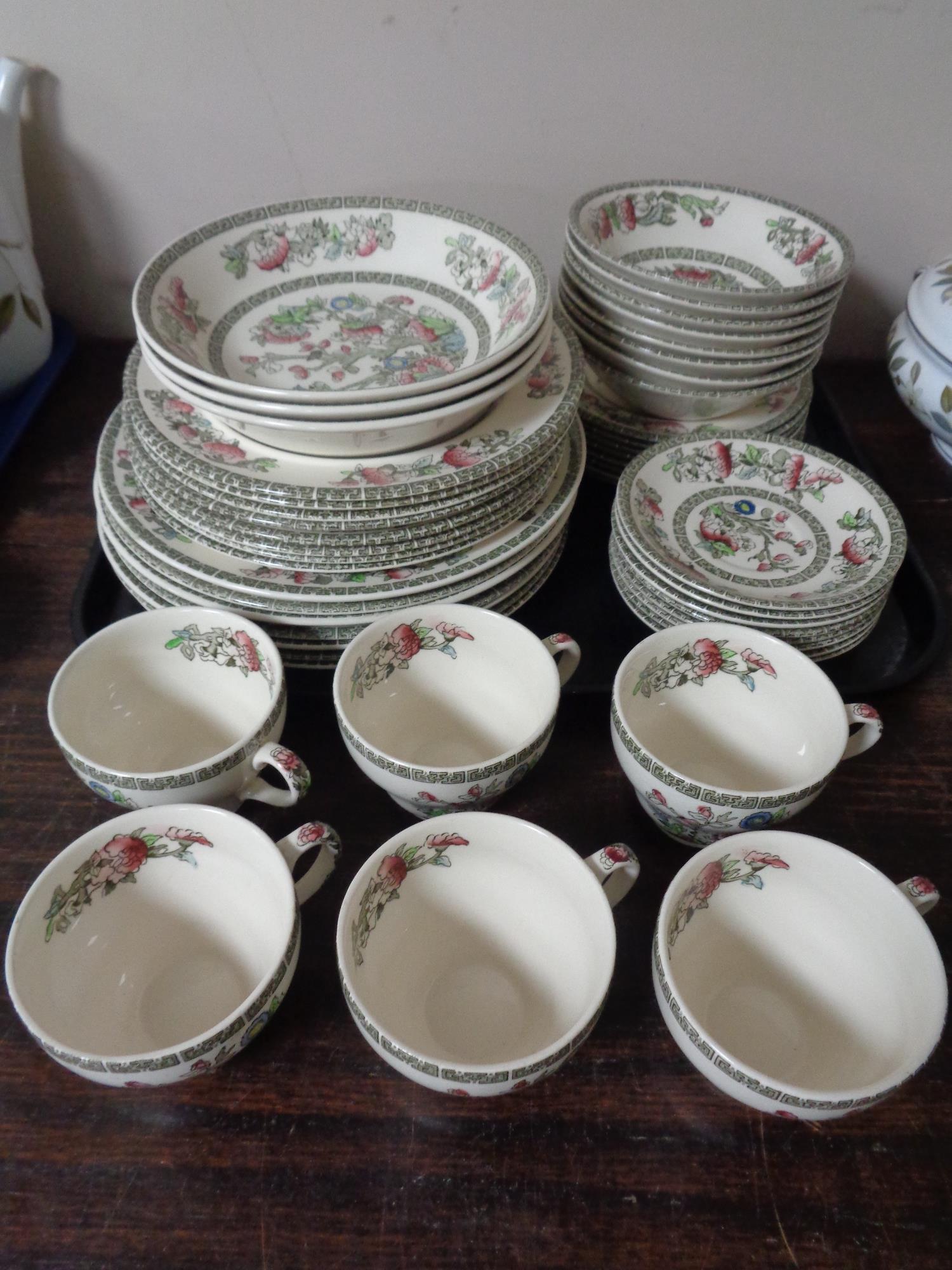 A tray of forty eight pieces of Johnson Brothers Indian Tree tea and dinner ware