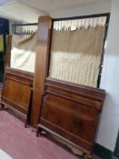 A pair of antique mahogany 3' bed frames