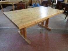 A heavy pine refectory dining table
