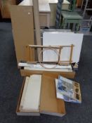 A quantity of artists's equipment including folios, canvases, stretchers,