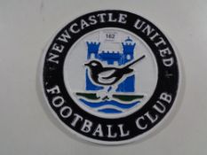 A cast iron plaque - Newcastle United