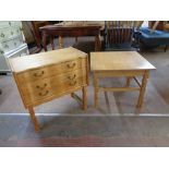 A blond oak serpentine fronted three drawer chest together with a blond oak square coffee table