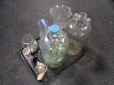 A tray of assorted glass ware including demi jons, cut glass perfume bottles,