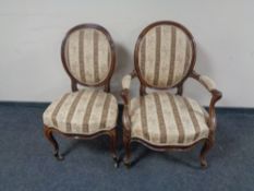 An antique walnut scroll armchair and matching salon chair