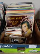 A box of LP records and 7" singles to include Neil Diamond, Donna Summer, The Shadows,