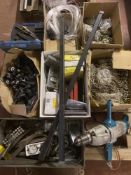 A pallet of hardware, chains, welding tools, roof bars,