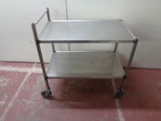 A stainless steel two tier trolley