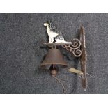 A cast iron bell modelled as collie dog