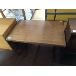 A mid 20th century teak refectory coffee table