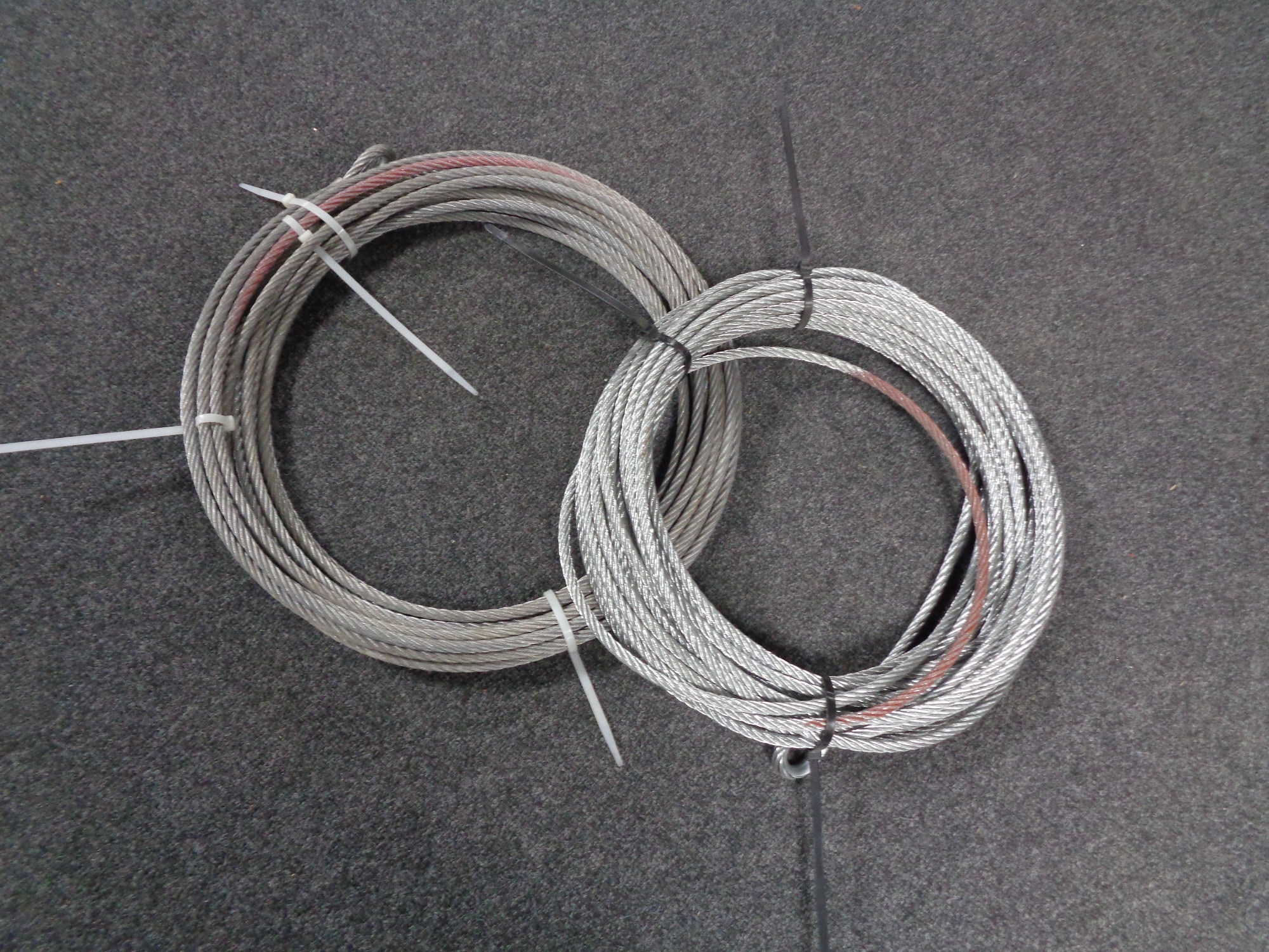 Two reels of steel cabling