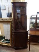 A mahogany Regency style corner display cabinet