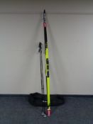 A pair of Fisher Pro skis with bindings,