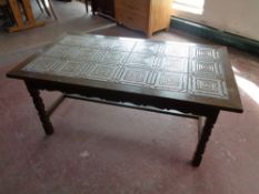 A 20th century oak tile top refectory coffee table