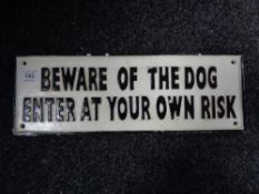 A cast iron sign - Beware to the dog