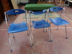 A pair of 20th century blue plastic and metal Sitland Ouvertere chairs together with one other