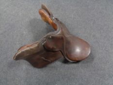 A brown leather saddle
