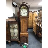 A 19th century inlaid oak thirty hour longcase clock with painted dial,