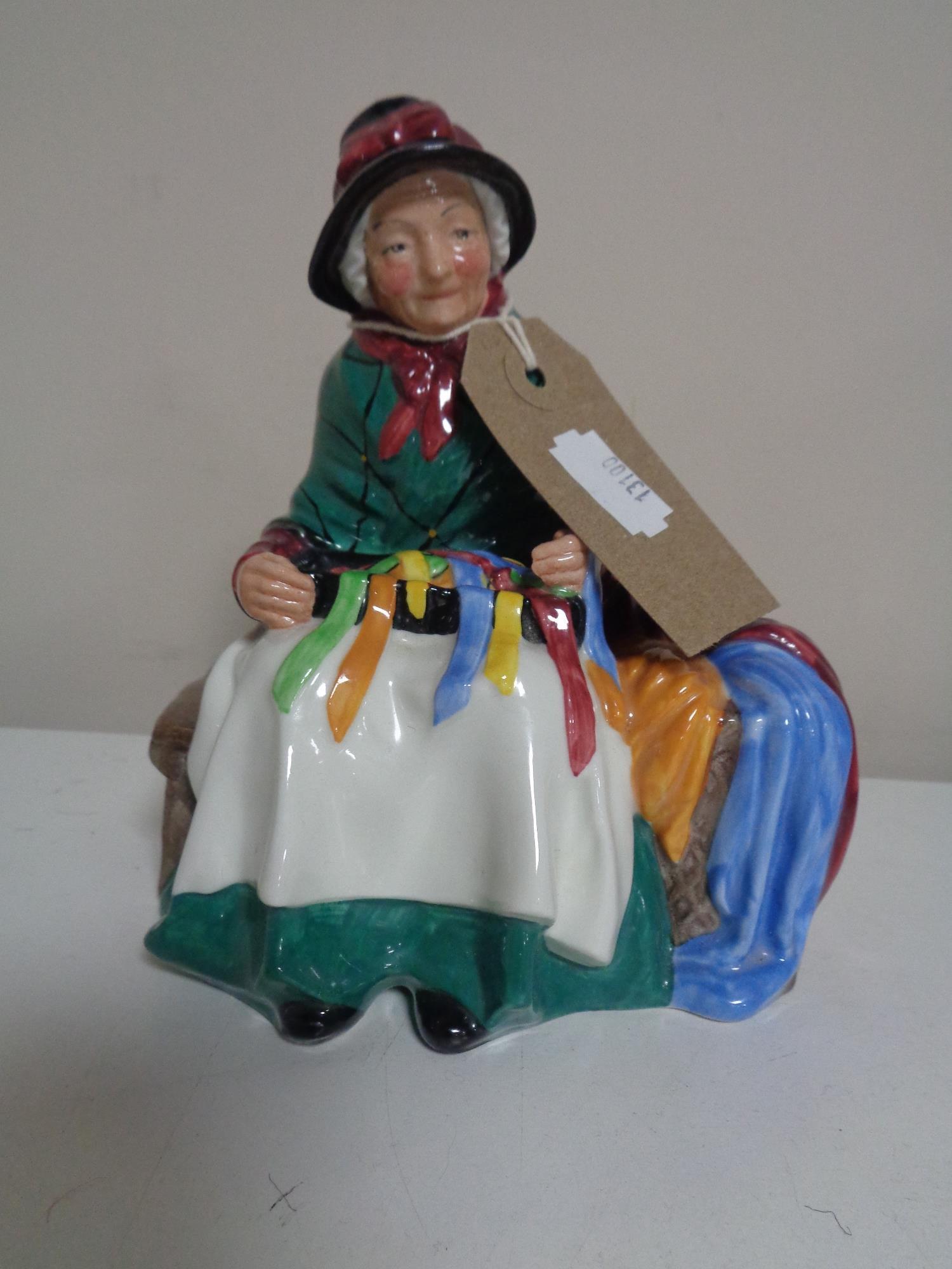 A Royal Doulton figure, Silks & Ribbons,