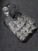 A tray of assorted drinking glasses,