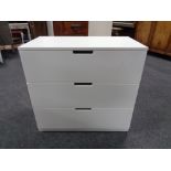 A contemporary white Ikea three drawer chest