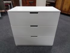 A contemporary white Ikea three drawer chest