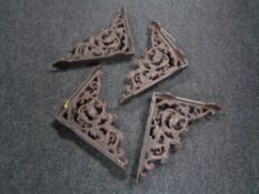 Four cast iron wall brackets