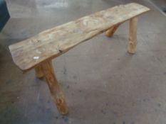 A rustic pine bench