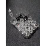A tray of assorted glass ware including decanter, two tone champagne flutes,
