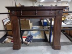 A fire surround in an oak finish