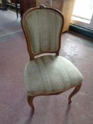A beech framed French dressing table chair upholstered in a striped fabric
