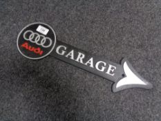 A cast iron plaque - Audi garage