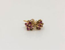 A pair of 9ct gold pink topaz cluster earrings.