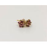 A pair of 9ct gold pink topaz cluster earrings.