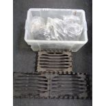 Three cast iron fire grates and a box of artificial fire coals CONDITION REPORT: