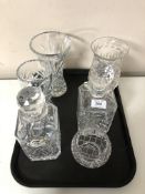 A pair of heavy cut-glass decanters, with stoppers,