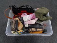 A box of lady's umbrellas, Radley purses,