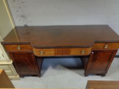 A George III mahogany breakfront twin pedestal sideboard with plate glass top CONDITION