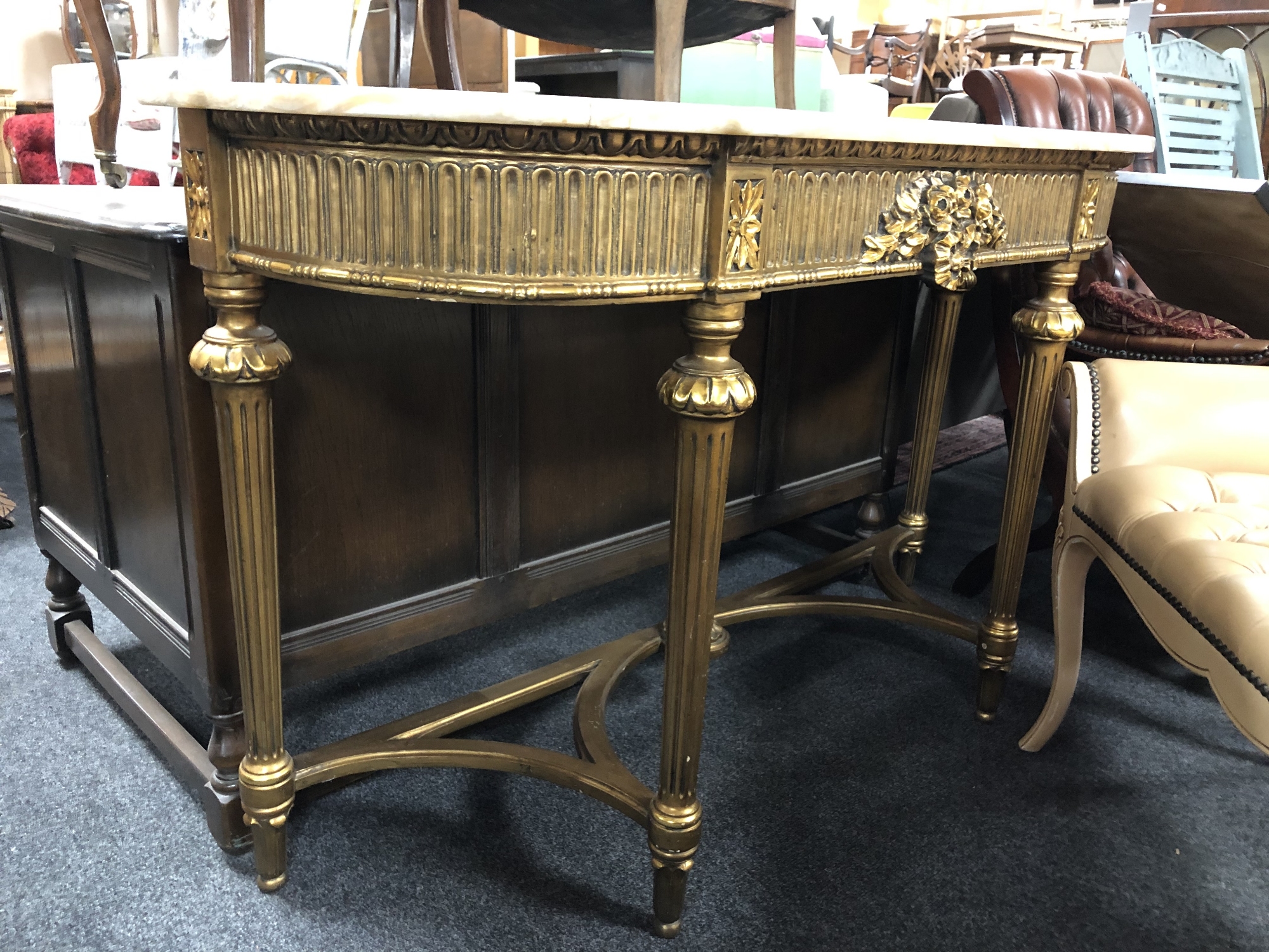 An ornate gilt marble topped console table CONDITION REPORT: 140cm wide by 42cm - Image 4 of 6