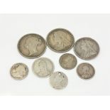 A group of Victorian silver coins; 1899 florin, six pences etc.