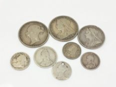 A group of Victorian silver coins; 1899 florin, six pences etc.